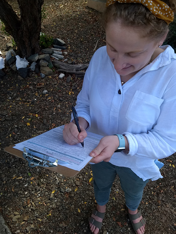 PHAST student Anna Bowie surveys community member in cluster 6 on St. Croix